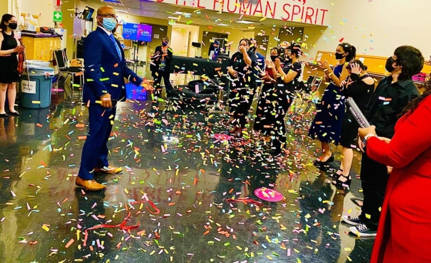 Dr Quinton Morris celebrating with students