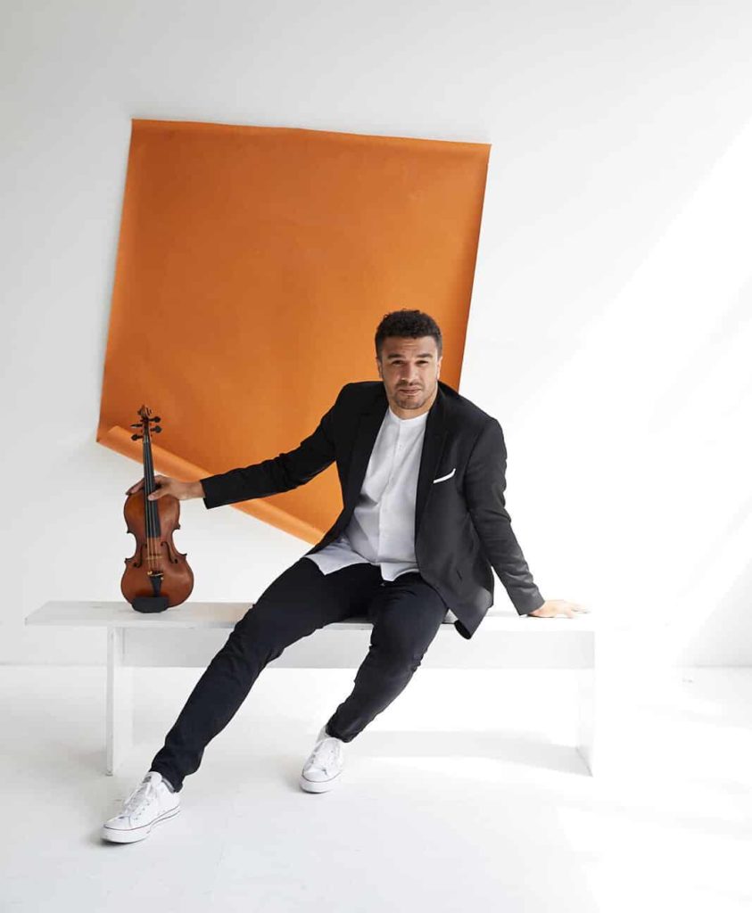 Curtis Stewart with a violin